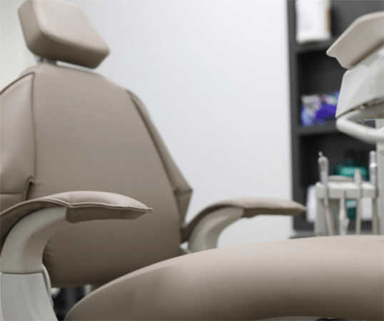 Empty dentist’s chair in modern office