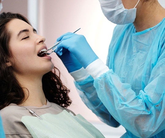 Woman at dentist for routine cleaning