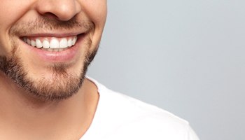 man smiling and knowing which cosmetic procedure is right for him
