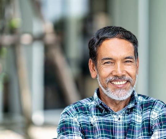 man smiling with dentures in Mesquite