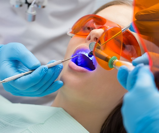 A woman receiving tooth-colored filling in Mesquite