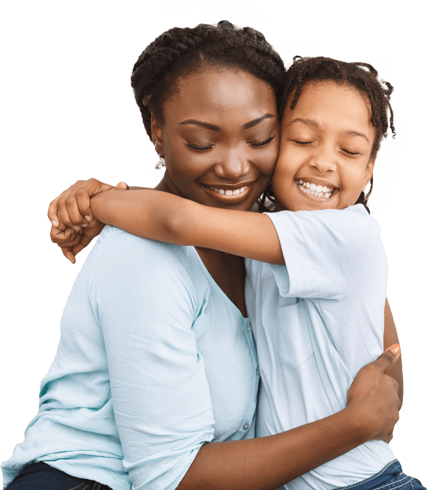 Mother giving daughter a hug after visiting family dentist in Mesquite