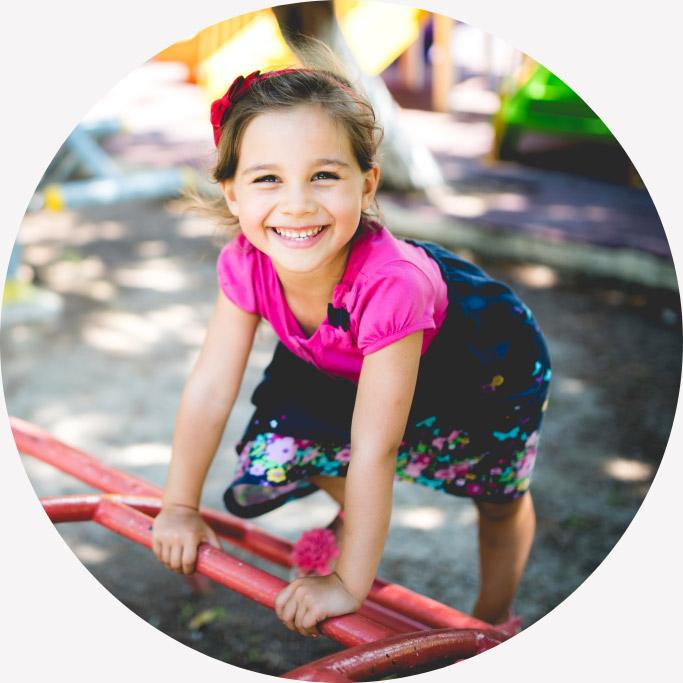 Young girl smiling during Boys and Girls Club of America event