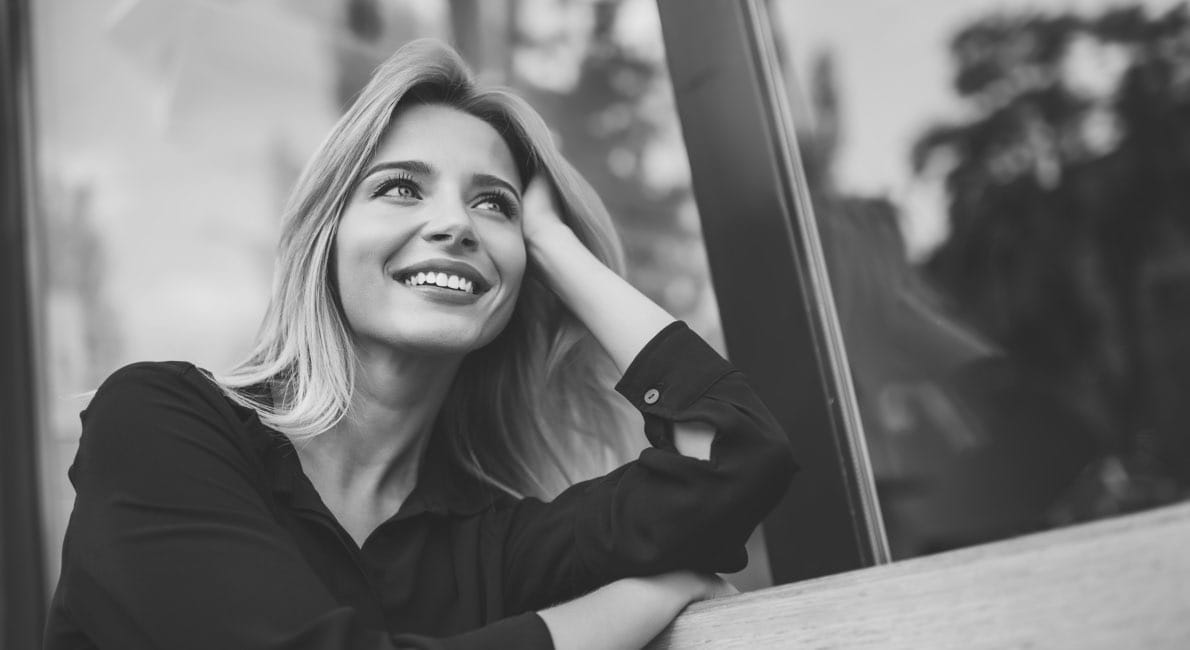 Woman sharing flawless smile after dental services in Mesquite