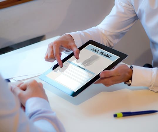 Dental insurance forms on tablet computer