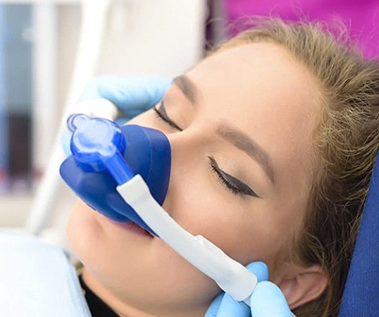young woman getting nitrous oxide sedation in Mesquite