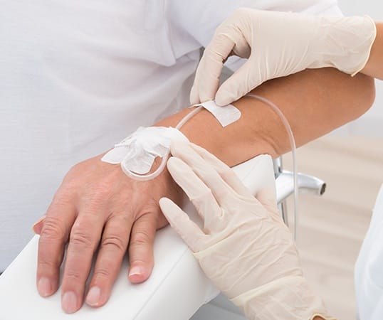 Patient receiving IV sedation dentistry