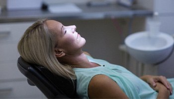 Woman relaxing with oral conscious sedation in Mesquite