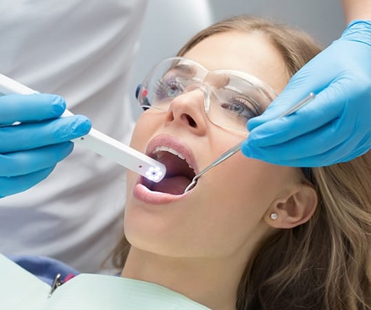 Dentist capturing intraoral images