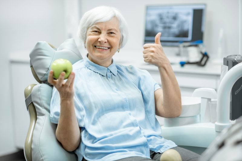 Woman smiling at dental appointment