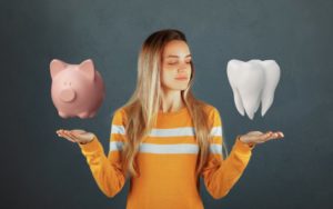 woman thinking about the cost of dental implants